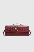 Melanie | Cartera de mano con lazo dorado