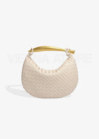 Alejandra – Bolso trenzado con asa dorada