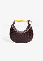 Alejandra – Bolso trenzado con asa dorada